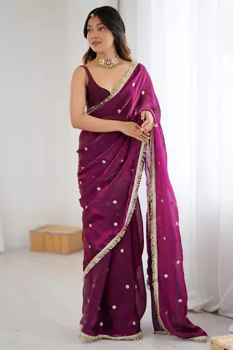 Wine tissue satin sequins saree with unstitched blouse piece.