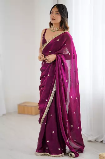 Wine tissue satin sequins saree with unstitched blouse piece.