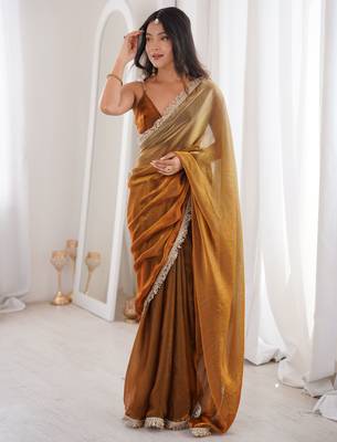Gold tissue satin sequins saree with unstitched blouse piece. 2