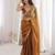 Gold tissue satin sequins saree with unstitched blouse piece.
