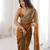 Gold tissue satin sequins saree with unstitched blouse piece.