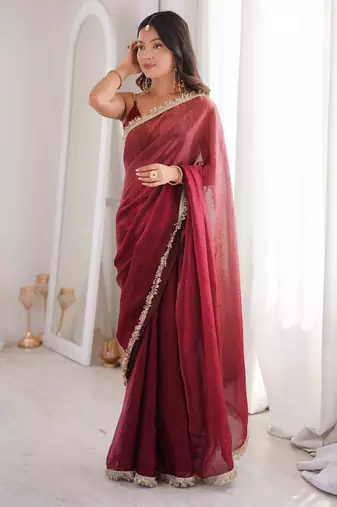 Maroon tissue satin sequins saree with unstitched blouse piece.