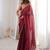 Maroon tissue satin sequins saree with unstitched blouse piece.