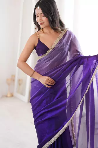 Purple tissue satin sequins saree with unstitched blouse piece.