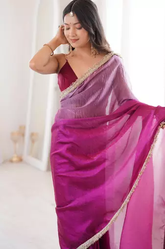 Wine tissue satin sequins saree with unstitched blouse piece.