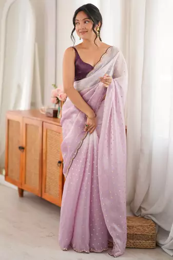 Lilac tissue embellished saree with unstitched blouse piece.
