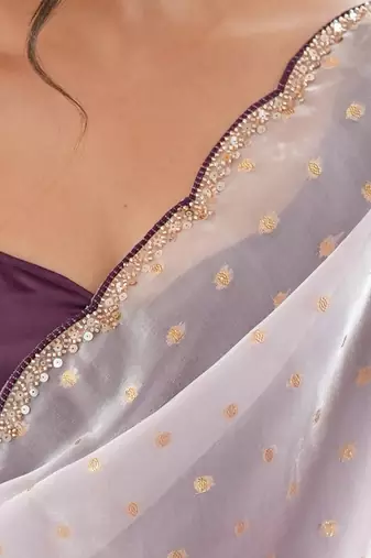 Lilac tissue embellished saree with unstitched blouse piece.