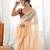 Mustard tissue embellished saree with unstitched blouse piece.