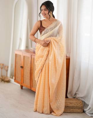 Mustard tissue embellished saree with unstitched blouse piece. 2