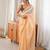 Mustard tissue embellished saree with unstitched blouse piece.