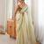 Olive tissue embellished saree with unstitched blouse piece.