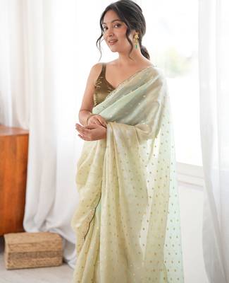 Olive tissue embellished saree with unstitched blouse piece. 5