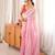 Pink tissue embellished saree with unstitched blouse piece.