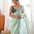 Sea green tissue embellished saree with unstitched blouse piece.