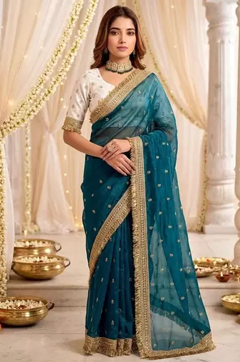 sky blue color satin sequin embroidered work saree with contrast blouse