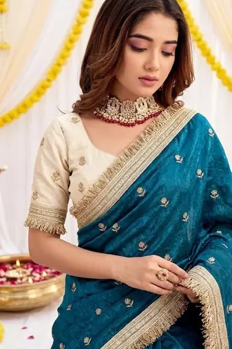 sky blue color satin sequin embroidered work saree with contrast blouse