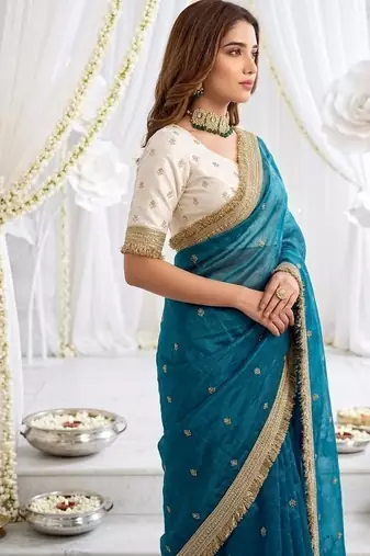 sky blue color satin sequin embroidered work saree with contrast blouse