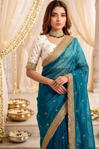 sky blue color satin sequin embroidered work saree with contrast blouse
