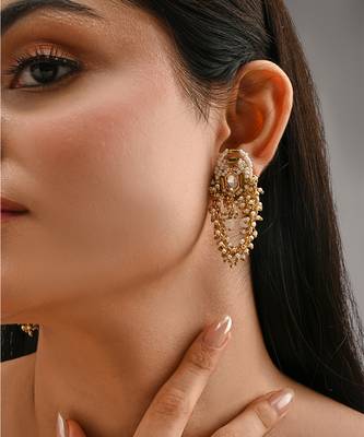 Gold toned kundan stud earrings 1