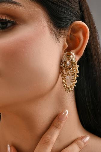 Gold toned kundan stud earrings