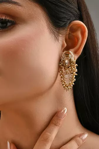 Gold toned kundan stud earrings