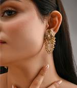 Gold toned kundan stud earrings