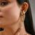 Gold toned kundan stud earrings