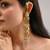 Gold plated metallic beige stones long ear chain
