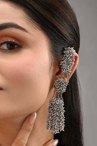 Silver plated multi layer crystal studded long earrings