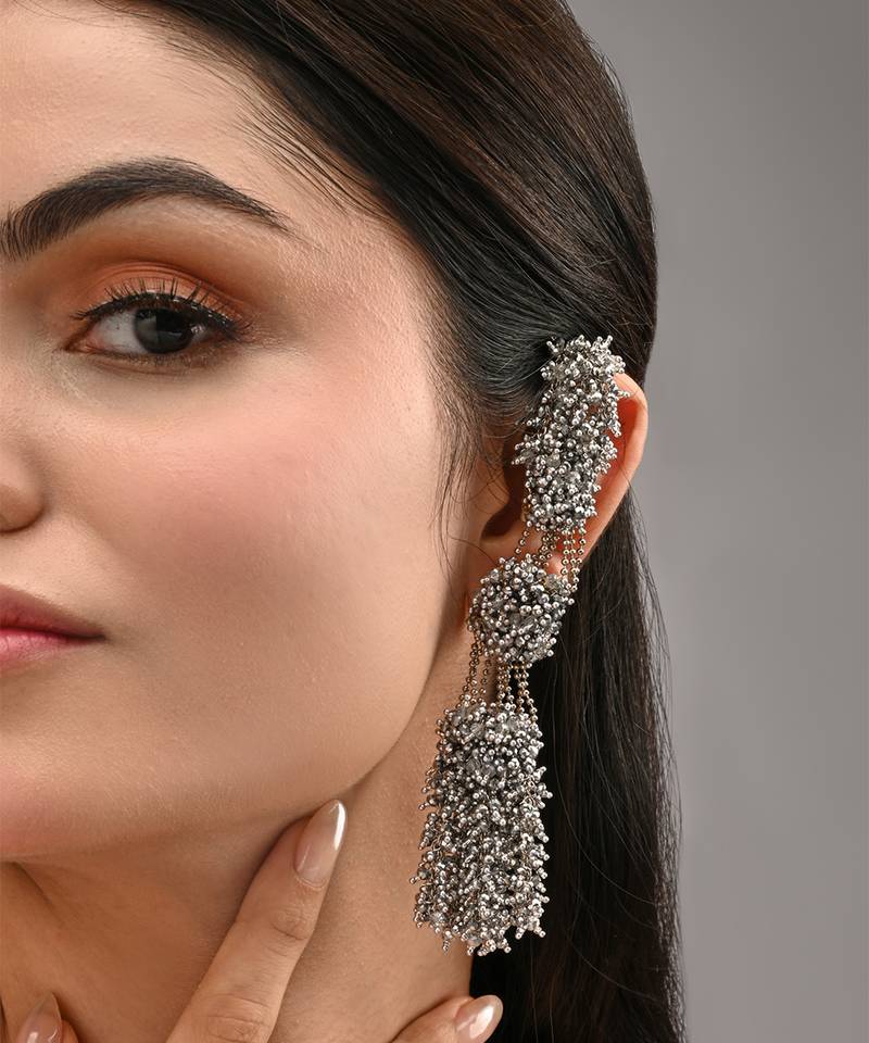 Silver plated multi layer crystal studded long earrings
