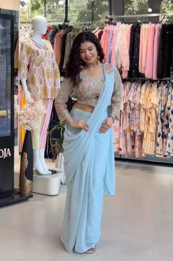 Sky blue faux georgette booti work full stitch up to 42 inch saree with blouse