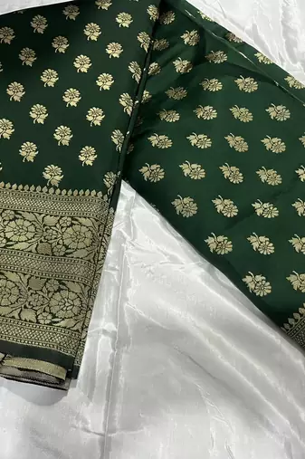 Green silk blend banarasi saree with unstitched blouse piece