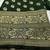 Green silk blend banarasi saree with unstitched blouse piece