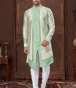 Cream indo-western set in an attached jacket style, with full embroidery, sequins,and thread work.