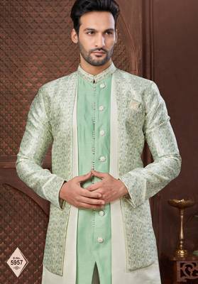 Cream indo-western set in an attached jacket style, with full embroidery, sequins,and thread work. 2