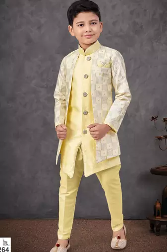 Lemon yellow jacket attached indo-western  set with computer stone work, lace & fancy buttons