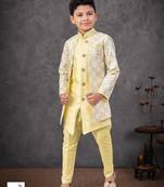 Lemon yellow jacket attached indo-western  set with computer stone work, lace & fancy buttons