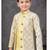 Lemon yellow jacket attached indo-western  set with computer stone work, lace & fancy buttons