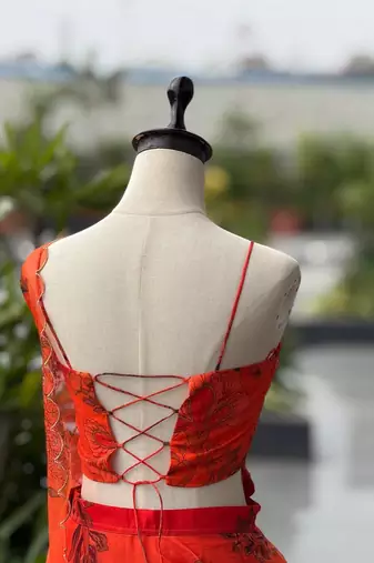 orange organza embroidered lehenga choli with free size upto 42
