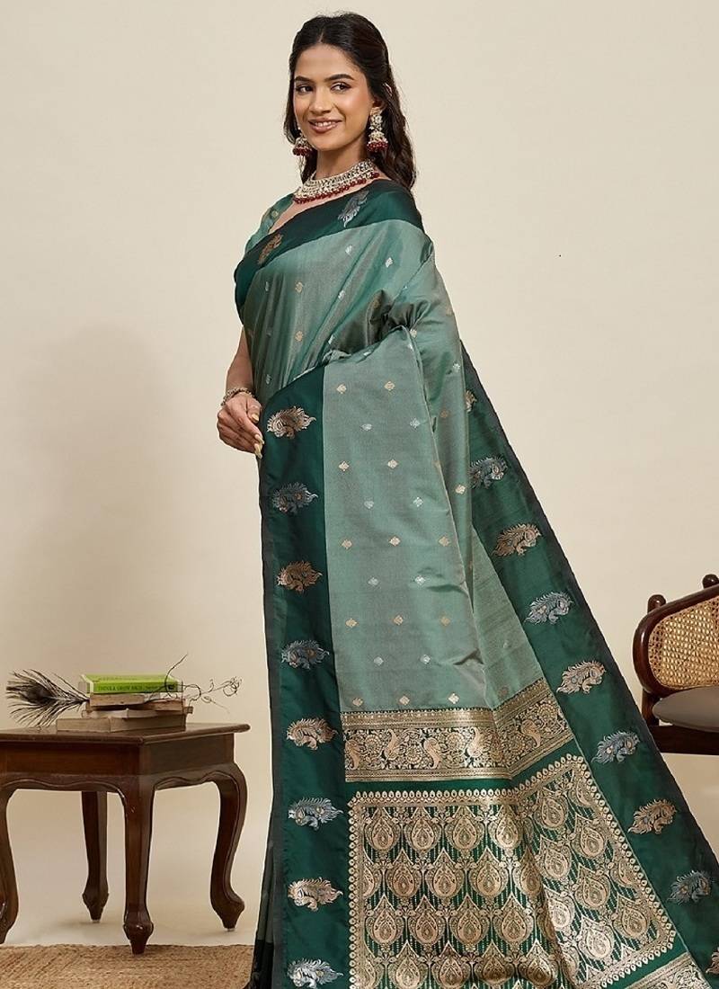 Dark green zari work silk blend saree with blouse