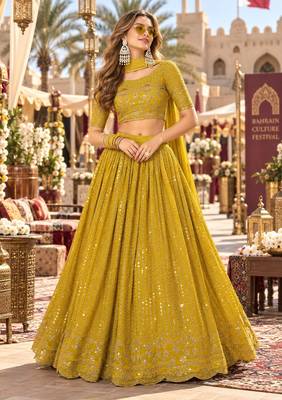Yellow georgette semi stitched lehenga choli with sequence & thread work 1