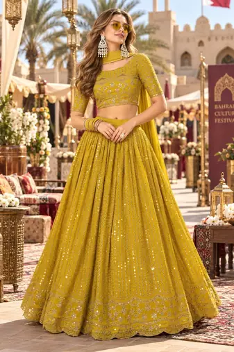 Yellow georgette semi stitched lehenga choli with sequence & thread work