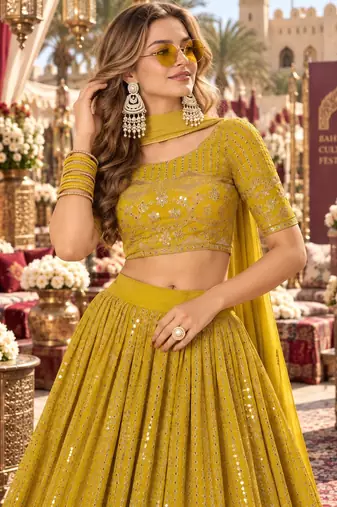 Yellow georgette semi stitched lehenga choli with sequence & thread work