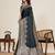 Dark green zari work satin silk saree with blouse
