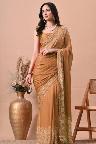 Women's orange floral print chiffon saree with unstitched blouse piece