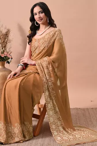 Women's orange floral print chiffon saree with unstitched blouse piece