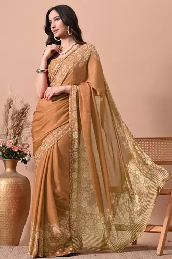 Women's orange floral print chiffon saree with unstitched blouse piece