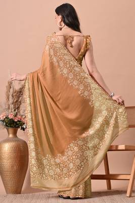 Women's orange floral print chiffon saree with unstitched blouse piece 4