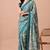 Women's teal floral print chiffon saree with unstitched blouse piece