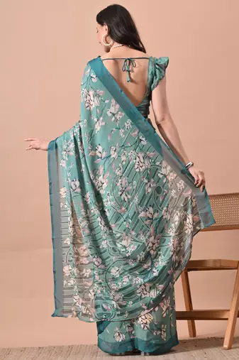 Women's teal floral print chiffon saree with unstitched blouse piece